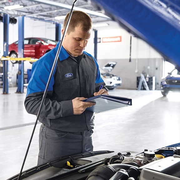  A Technician performing battery replacement services at the showroom in Havana, FL